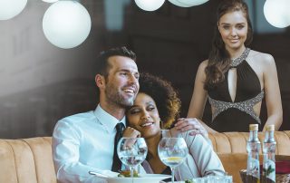 Happy couple at dinner in the restaurant
